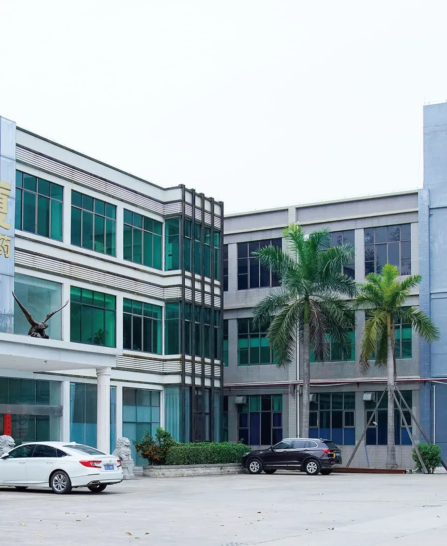 The Huaxia Biopharmaceuticals manufacturing facility in Guangzhou, with the main building entrance and front yard.